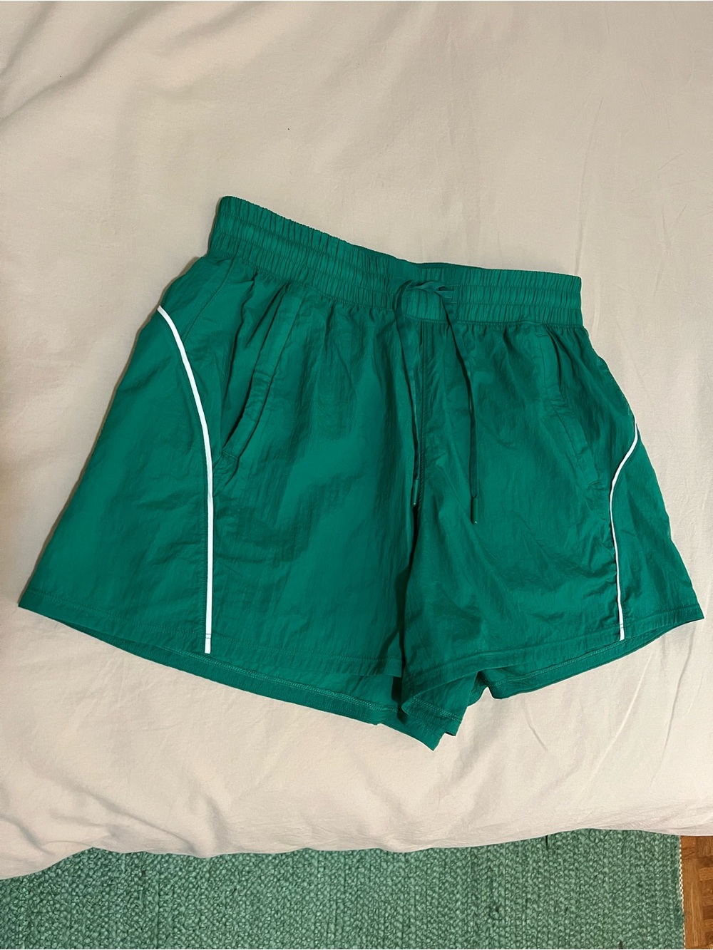 Lululemon Green license train size 6 Athletic Shorts with White Piping